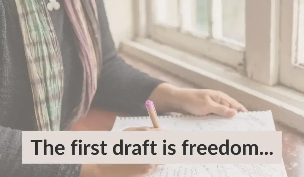 A woman's hands, one holding a notepad and the other is mindmapping ideas for a novel